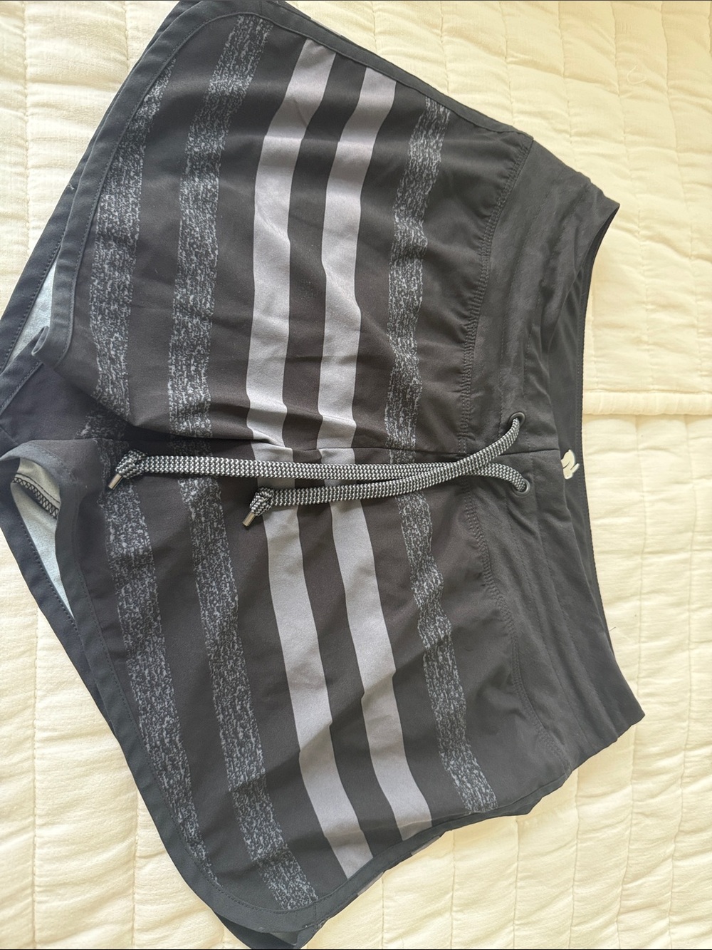 Black Athletic Shorts with Reflective Gray Stripes.